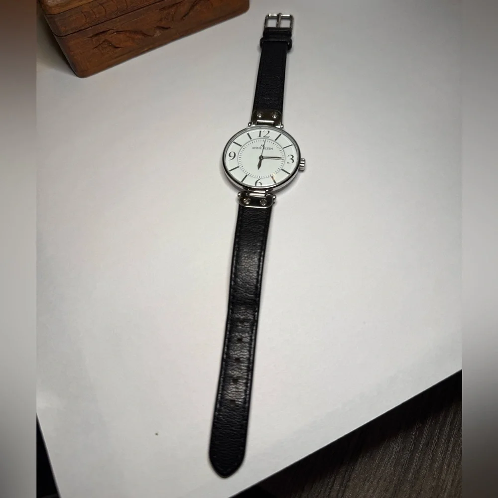 Anne Klein Women’s Watch Black Leather Strap Silver Tone Model Y1211
